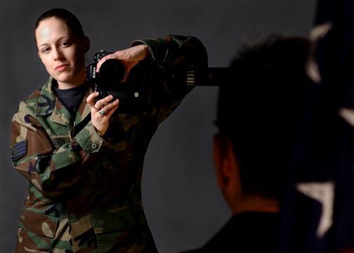 Amber Whittington taking photos in Air Force Uniform